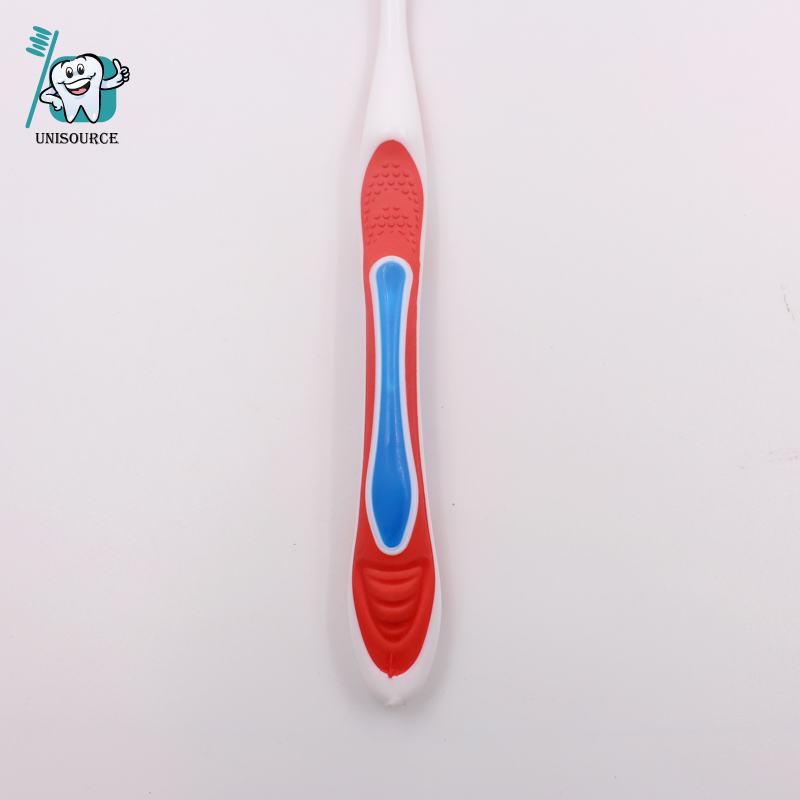 Cepillo de dientes para adultos con masajeadores con punta de goma